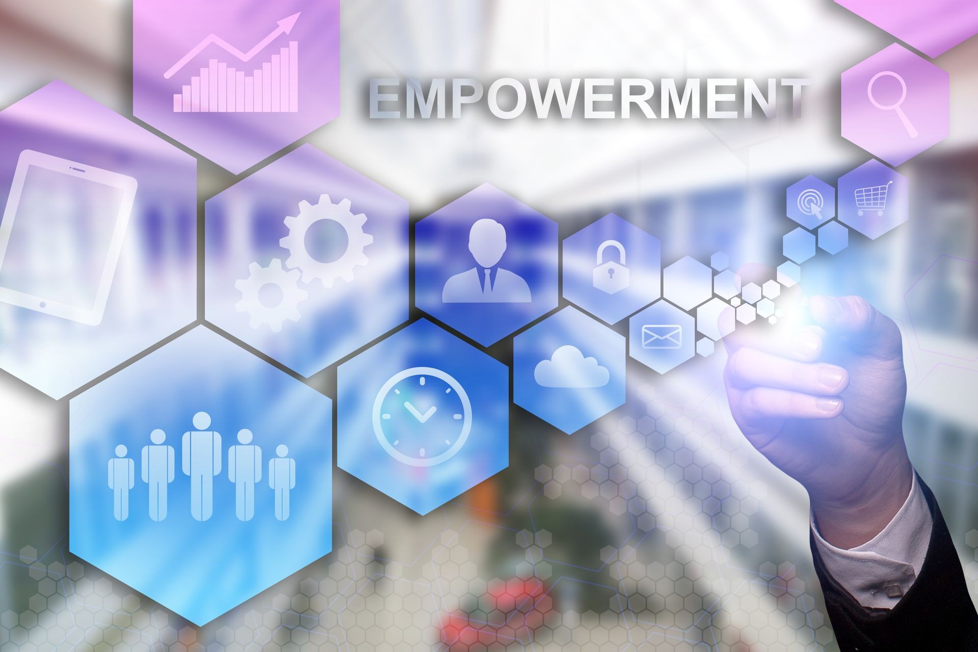 Businessman draws "Empowerment" on the virtual screen. Business concept. Internet concept.